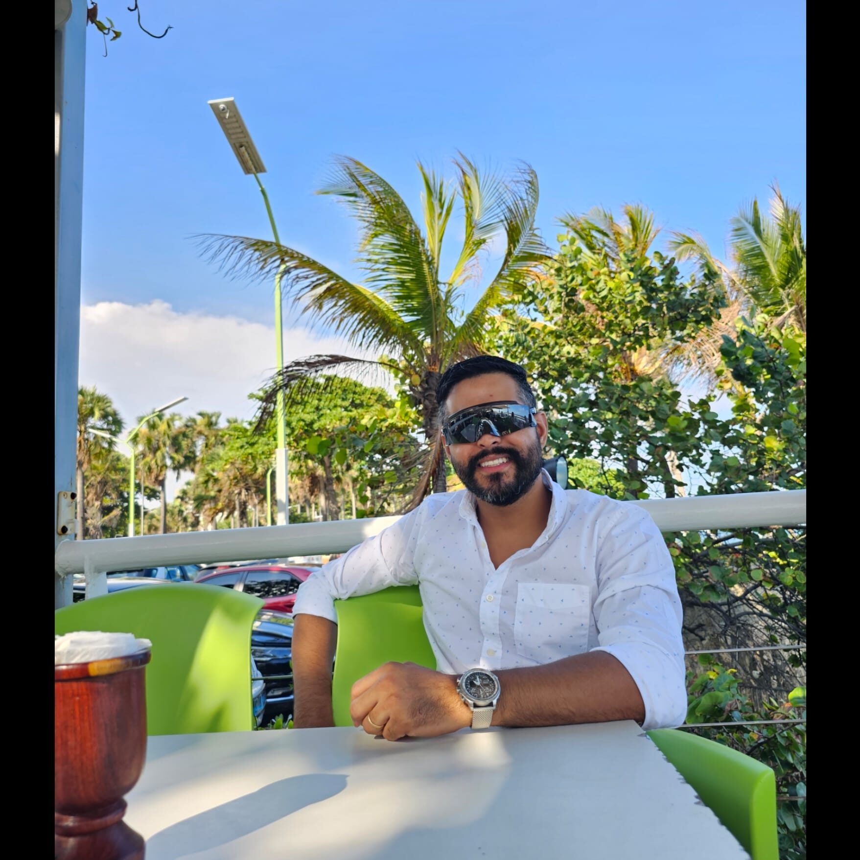 Angel Lopez enjoying a calm morning outdoors, representing freedom and balance.